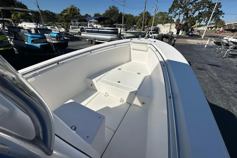 Slide: The Image of 2005 Topaz 24 Silverhawk boat interior, showcasing spacious seating and sleek design. - 7
