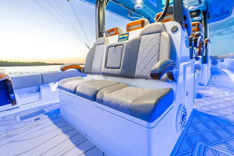 Slide: The Image of Luxurious interior of 2025 Freeman 43 boat with elegant seating and ambient lighting. - 28