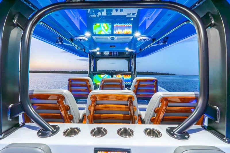 Slide: The Image of Interior view of 2025 Freeman 43 boat with advanced navigation screens and luxurious seating. - 35