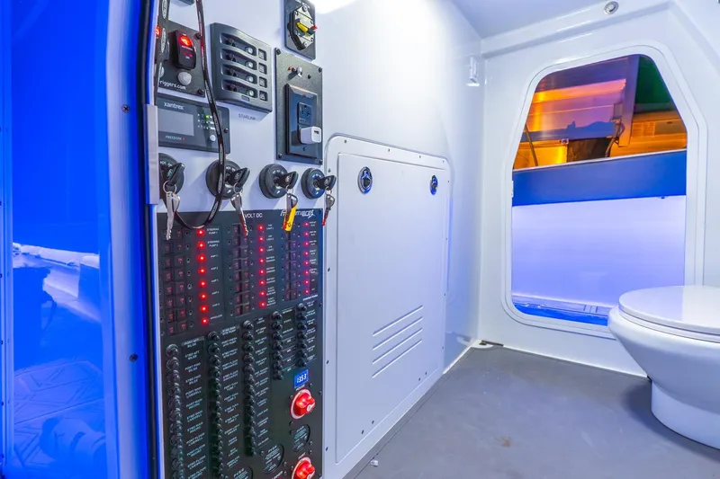 Slide: The Image of Control panel and interior of Freeman 43, 2025 model, with modern design and lighting. - 47