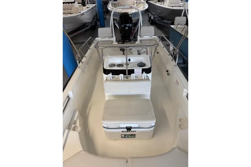 Slide: The Image of 2026 Boston Whaler 170 Montauk boat interior with seating and console. - 6