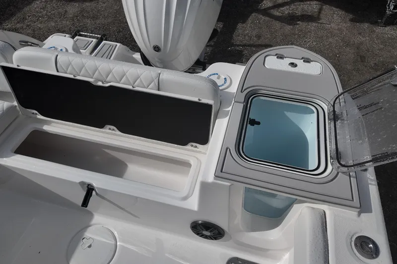 Slide: The Image of 2026 Sea Fox 248 Commander boat interior with storage compartments and seating. - 16