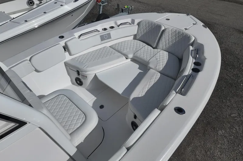 Slide: The Image of 2026 Sea Fox 248 Commander boat interior with luxurious white seating and modern design. - 7
