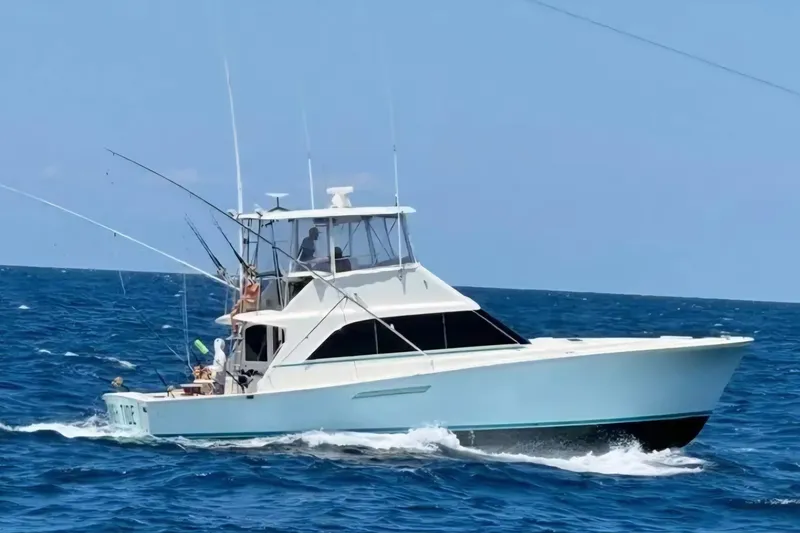 The Image of 1988 Ocean Yachts 48 Super Sport cruising on open sea. - 1