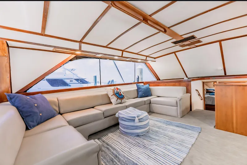 Slide: The Image of Luxurious interior of 1988 Ocean Yachts 48 Super Sport with plush seating and nautical decor. - 18