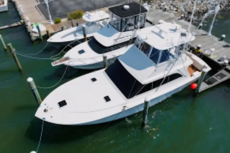 Slide: The Image of 1988 Ocean Yachts 48 Super Sport docked at marina, aerial view. - 6