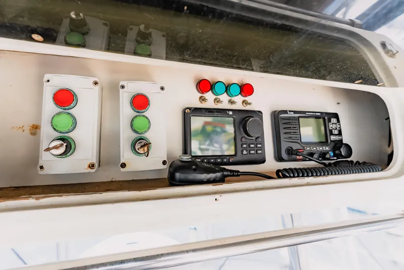 Slide: The Image of Control panel of a 1988 Ocean Yachts 48 Super Sport with navigation equipment. - 11