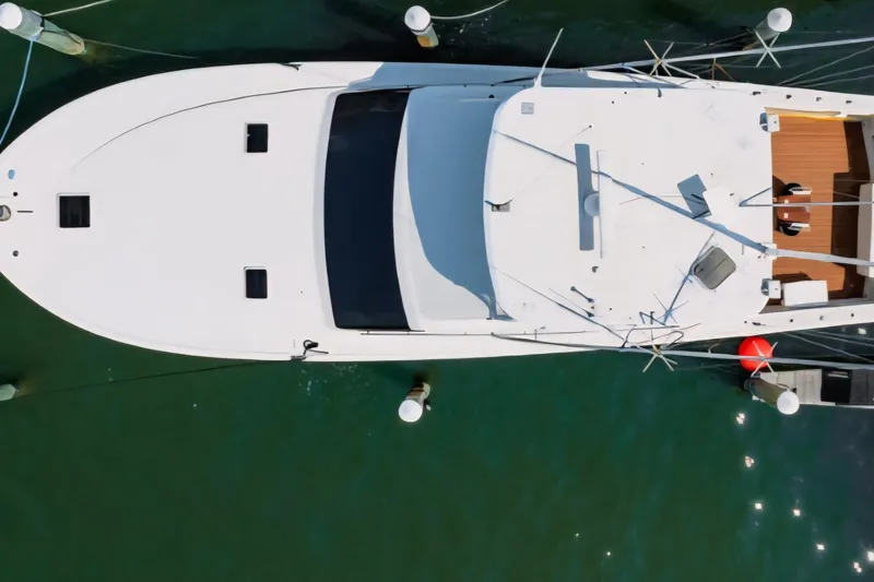 Slide: The Image of Aerial view of 1988 Ocean Yachts 48 Super Sport docked in marina. - 7
