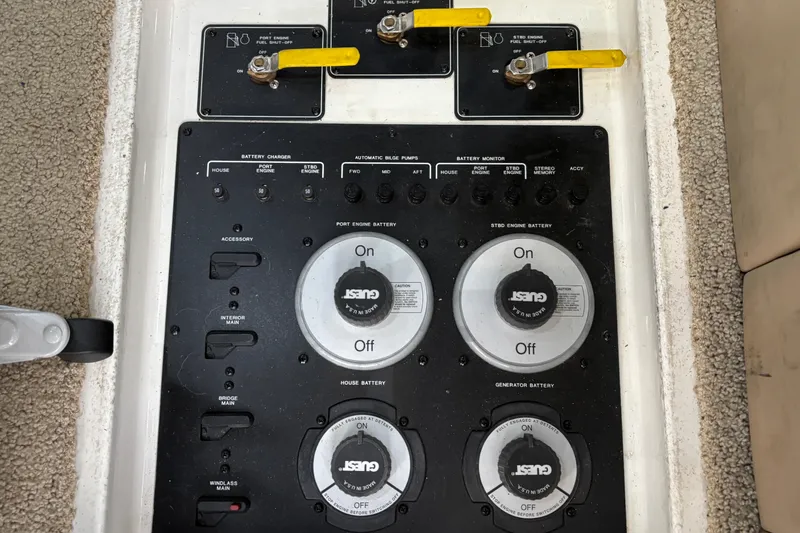 Slide: The Image of Control panel of a 2000 Bayliner 3788 Command Bridge Motoryacht with battery switches. - 27