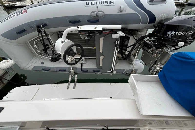 Slide: The Image of Interior of 2000 Bayliner 3788 Command Bridge Motoryacht with cozy seating and kitchenette. - 6