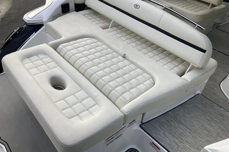 Slide: The Image of 2021 Cobalt R7 Surf boat with luxurious white quilted seating. - 12