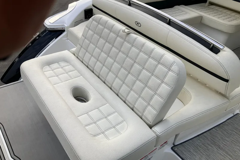 Slide: The Image of 2021 Cobalt R7 Surf boat with white quilted seating and cup holder. - 13