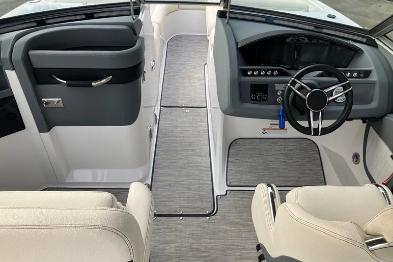 Slide: The Image of 2021 Cobalt R7 Surf boat interior with modern dashboard and steering wheel. - 18