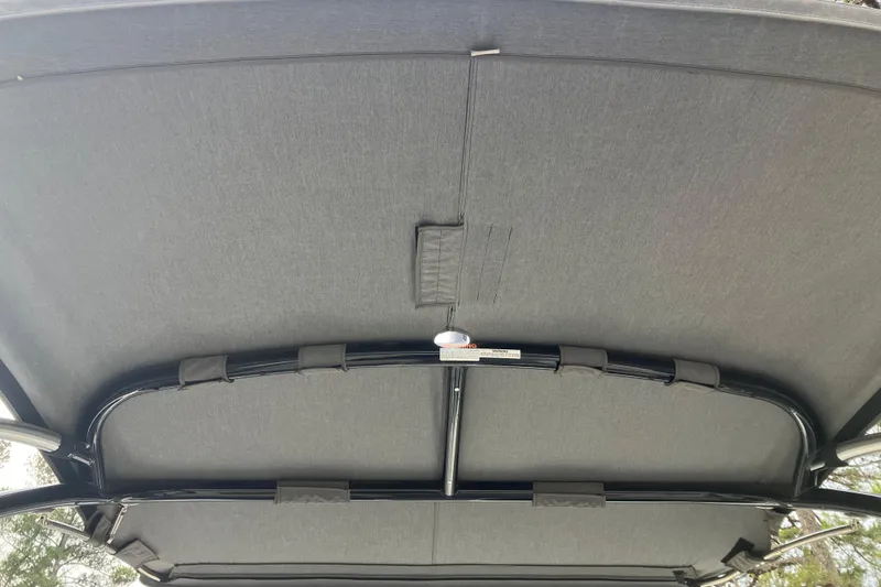 Slide: The Image of 2021 Cobalt R7 Surf boat canopy interior, featuring sleek design and sturdy framework. - 32