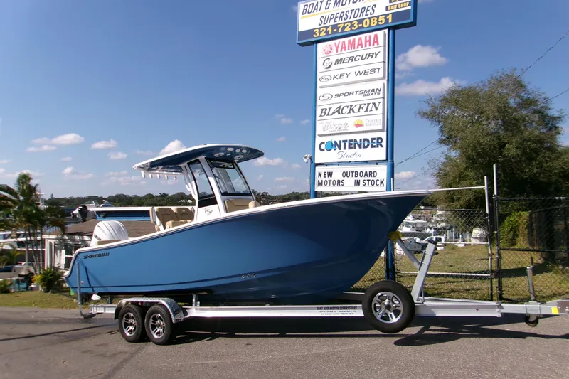 The Image of 2025 Sportsman Heritage 231 Center Console boat on trailer at dealership. - 0