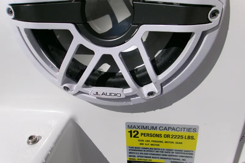Slide: The Image of Speaker and capacity label on 2025 Sportsman Heritage 231 Center Console boat. - 22
