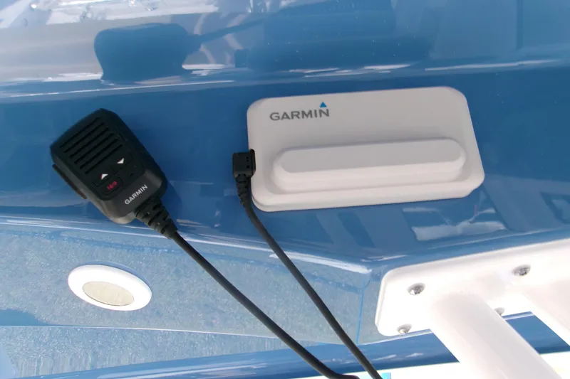 Slide: The Image of Garmin device on 2025 Sportsman Heritage 231 Center Console boat dashboard. - 24