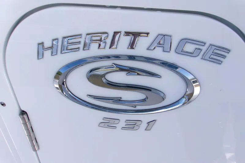 Slide: The Image of 2025 Sportsman Heritage 231 Center Console logo on white surface. - 25