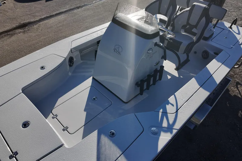 Slide: The Image of 2026 Blazer 675 Ultimate Bay boat interior with seating and console. - 10