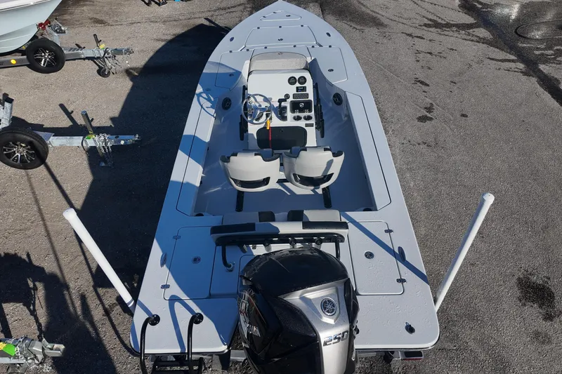 Slide: The Image of 2026 Blazer 675 Ultimate Bay boat with dual seats and Yamaha engine. - 5