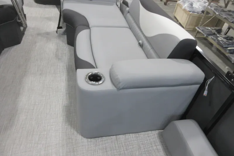 Slide: The Image of 2026 Tahoe Pontoon 23 LTZ Quad Lounge interior with gray seating and cup holder. - 108