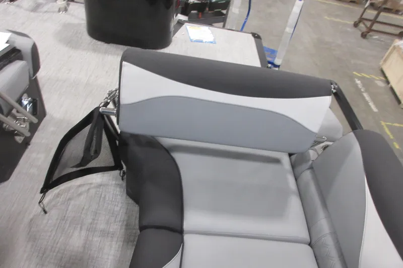 Slide: The Image of 2026 Tahoe Pontoon 23 LTZ Quad Lounge interior seating, featuring sleek gray and black upholstery. - 111