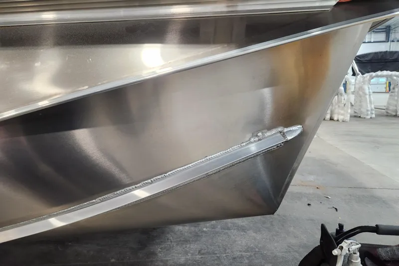 Slide: The Image of 2026 Tahoe Pontoon 23 LTZ Quad Lounge with luxurious seating and cup holder. - 20