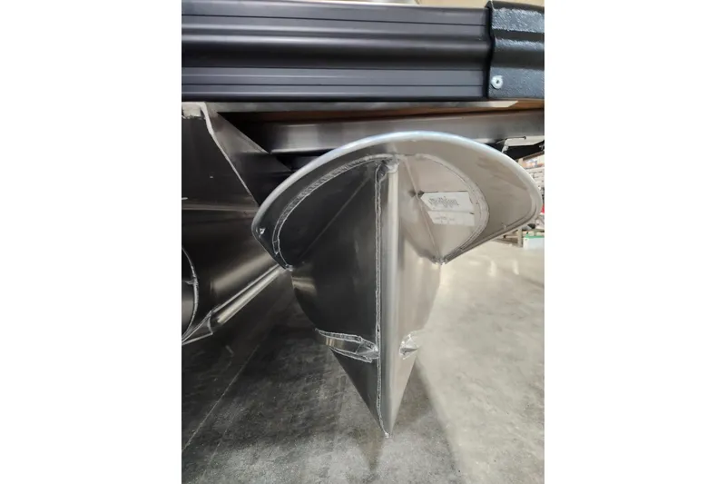 Slide: The Image of 2026 Tahoe Pontoon 23 LTZ Quad Lounge dashboard with steering wheel and controls. - 22