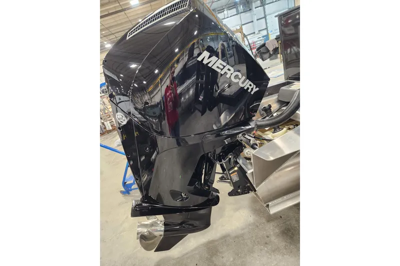 Slide: The Image of 2026 Tahoe Pontoon 23 LTZ Quad Lounge interior with storage drawers and seating. - 26