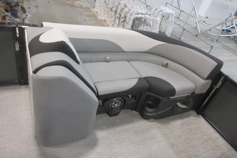 Slide: The Image of 2026 Tahoe Pontoon 23 LTZ Quad Lounge in a showroom setting. - 55