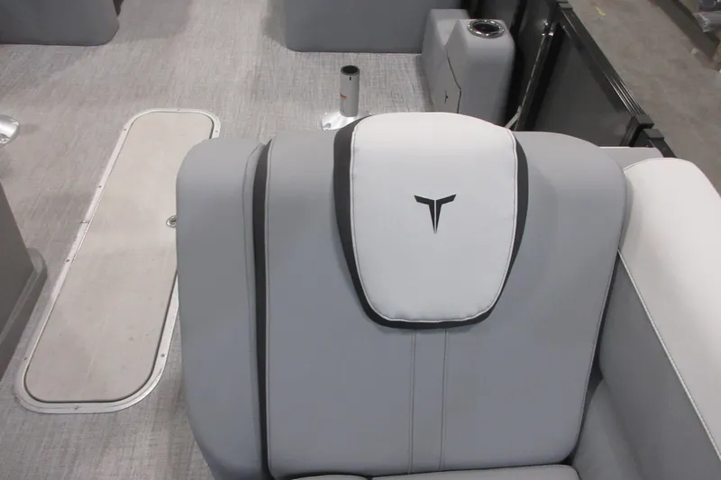 Slide: The Image of 2026 Tahoe Pontoon 23 LTZ Quad Lounge with Mercury engine in showroom. - 56