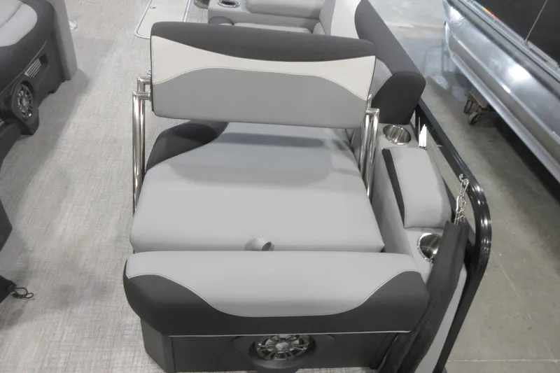 Slide: The Image of 2026 Tahoe Pontoon 23 LTZ Quad Lounge, sleek design detail in a showroom. - 63