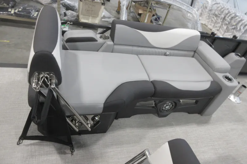 Slide: The Image of Close-up of 2026 Tahoe Pontoon 23 LTZ Quad Lounge pontoon detail in a showroom. - 64