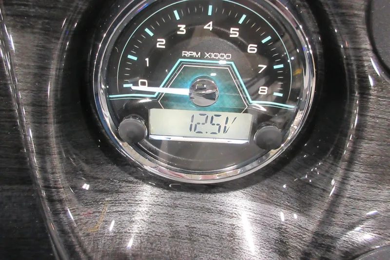 Slide: The Image of Tachometer of 2026 Tahoe Pontoon 23 LTZ Quad Lounge displaying 1251 RPM. - 86