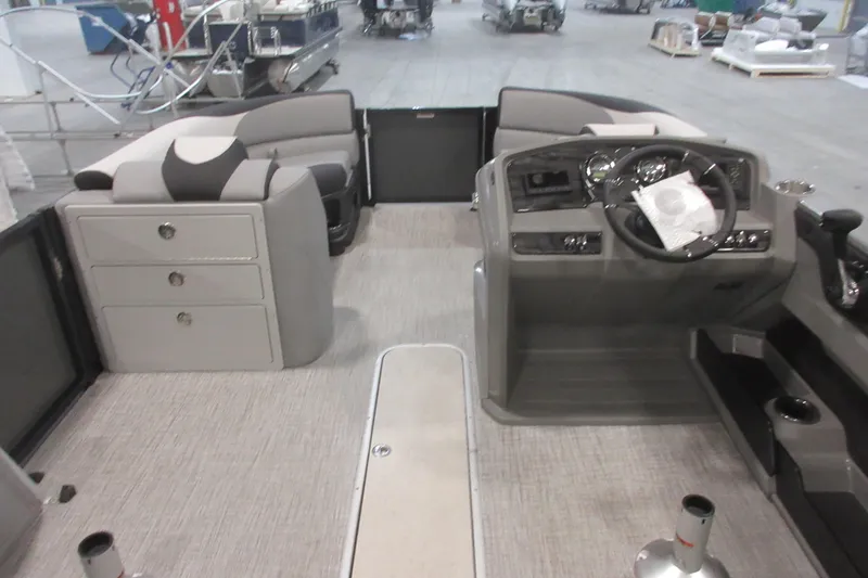 Slide: The Image of 2026 Tahoe Pontoon 23 LTZ Quad Lounge interior with modern helm and seating. - 89