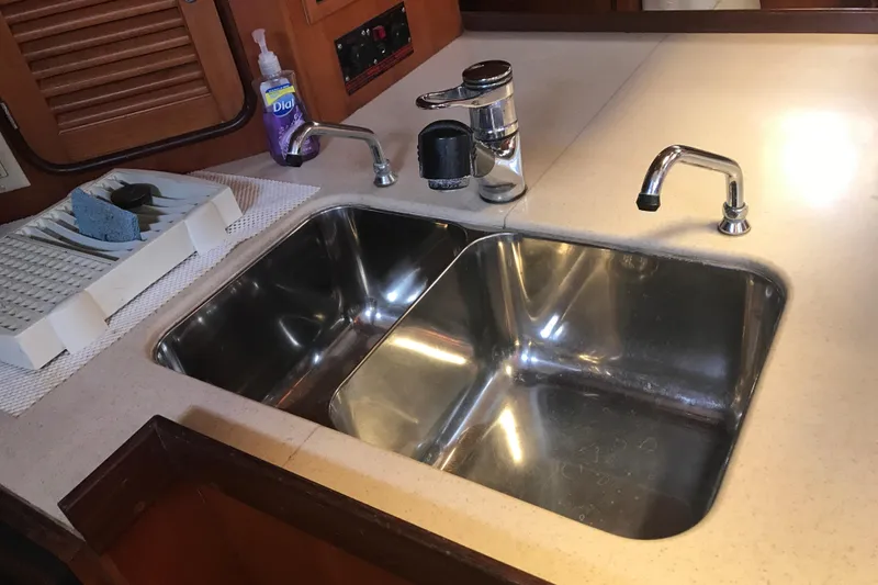 Slide: The Image of Stainless steel double sink in a Passport 456 yacht kitchen, 1999 model. - 11