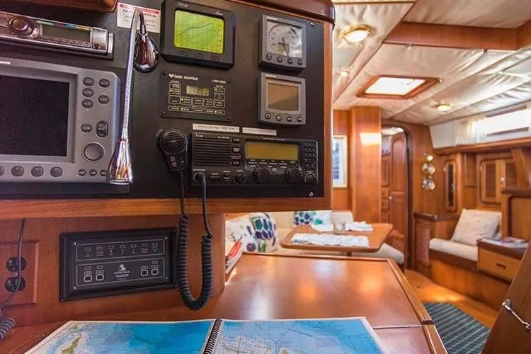 Slide: The Image of Navigation equipment and cozy interior of a 1999 Passport 456 yacht. - 25