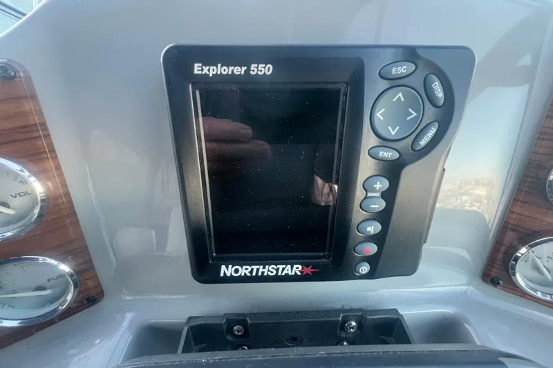 Slide: The Image of Control panel of a 2008 Bayliner 245 Cruiser with Northstar Explorer 550 display. - 15