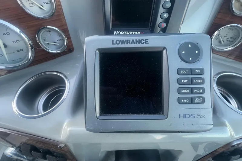 Slide: The Image of Dashboard of 2008 Bayliner 245 Cruiser with Lowrance HDS 5x display and gauges. - 16