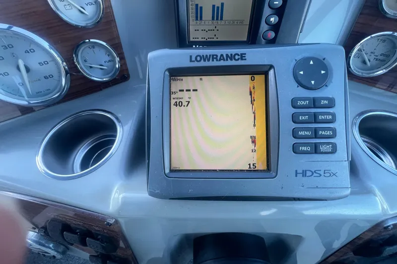 Slide: The Image of Dashboard of a 2008 Bayliner 245 Cruiser with Lowrance HDS5x display. - 17