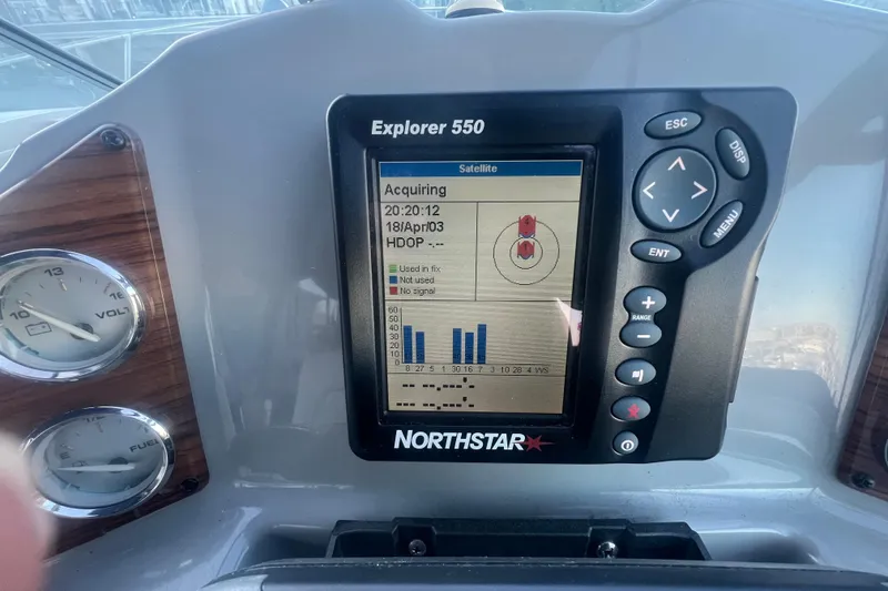 Slide: The Image of 2008 Bayliner 245 Cruiser dashboard with Northstar Explorer 550 GPS system. - 18
