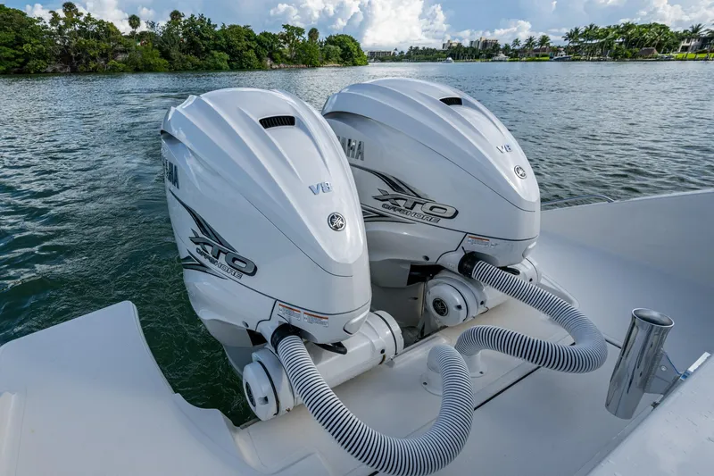 Slide: The Image of Twin Yamaha V8 outboard engines on a 2023 Pursuit S 358 Sport boat. - 17