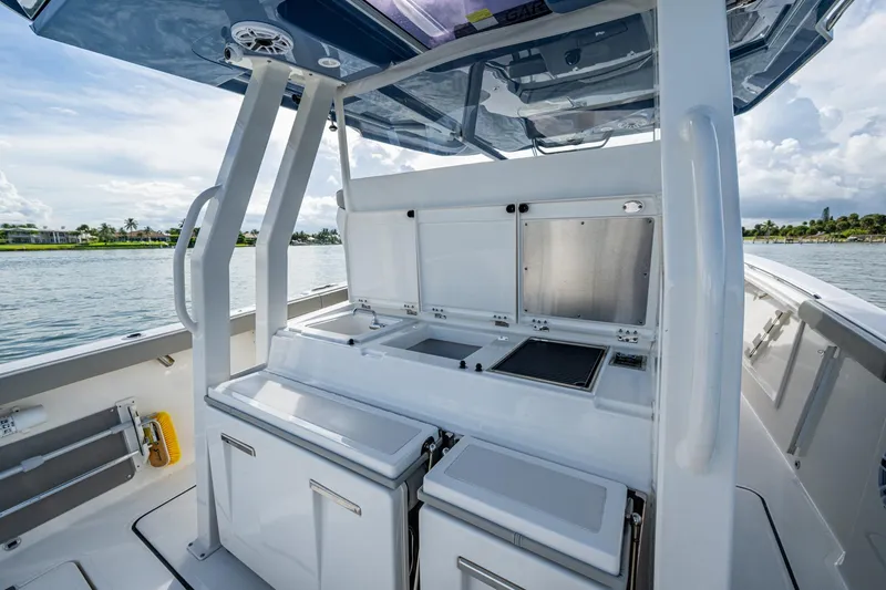 Slide: The Image of 2023 Pursuit S 358 Sport boat interior with sleek design and modern amenities. - 27