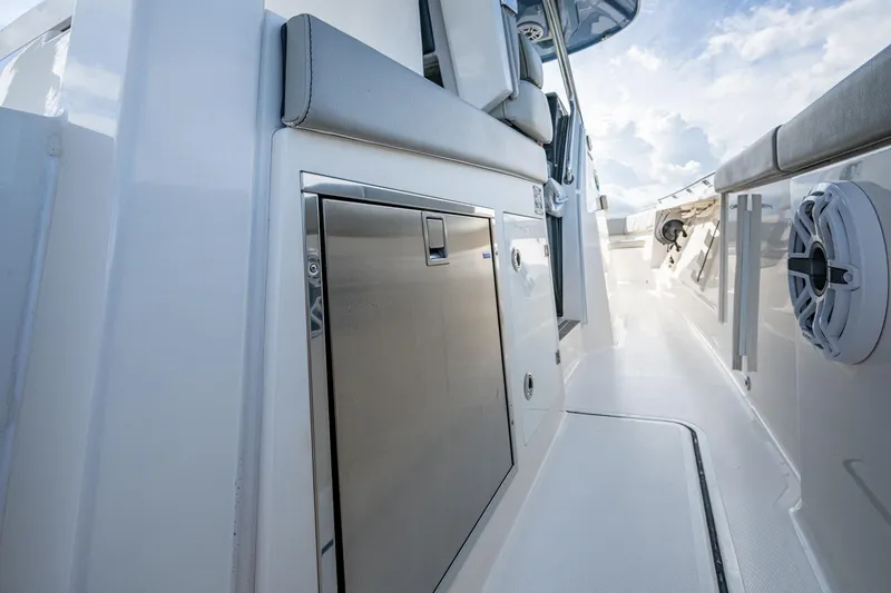 Slide: The Image of 2023 Pursuit S 358 Sport boat interior with sleek design and modern amenities. - 28