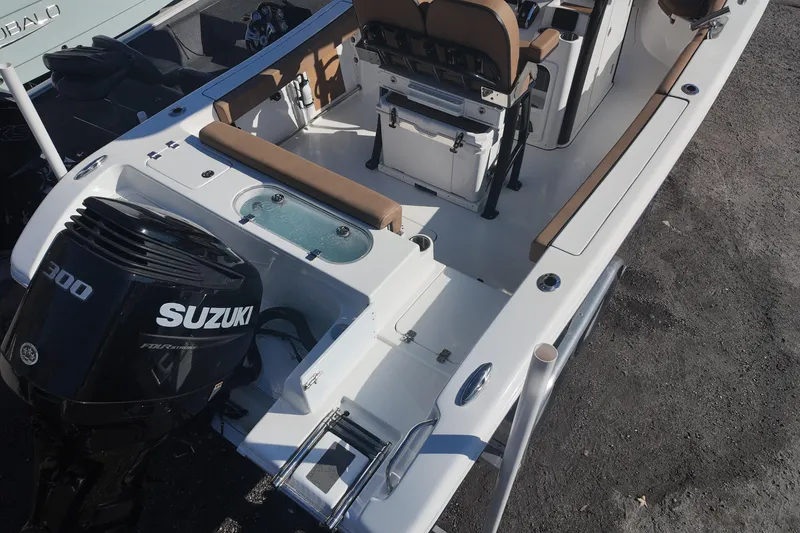 Slide: The Image of 2023 Sea Pro boat with Suzuki 300 engine, featuring spacious seating and modern design. - 7