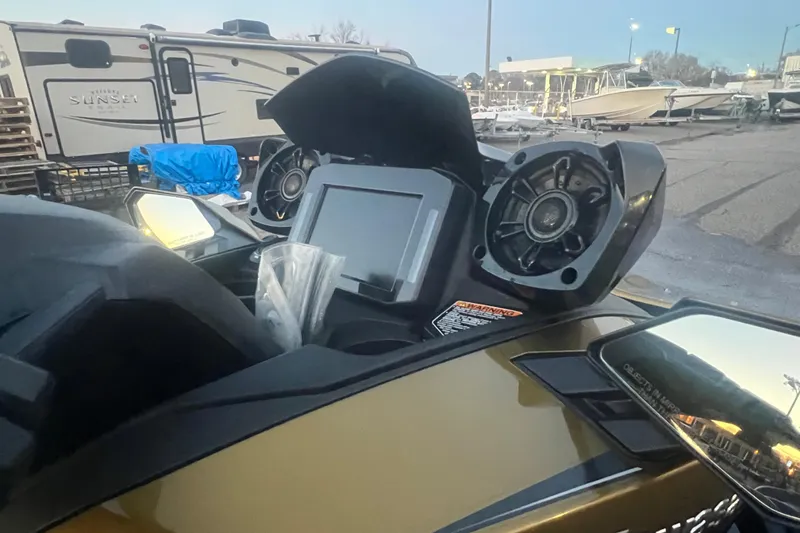 Slide: The Image of 2023 Kawasaki Jetski Ultra 310LX-S dashboard with speakers and display screen. - 10
