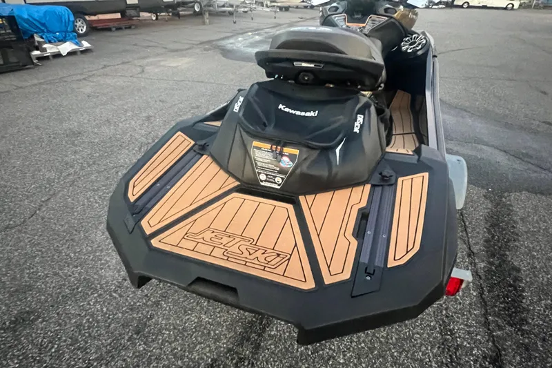 Slide: The Image of 2023 Kawasaki Jetski Ultra 310LX-S on trailer, showcasing rear deck design. - 12