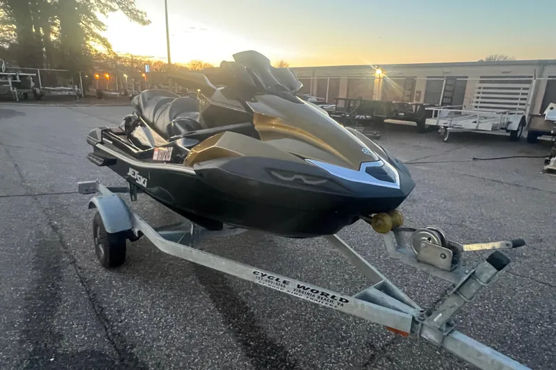 Slide: The Image of 2023 Kawasaki Jetski Ultra 310LX-S on trailer at sunset. - 16