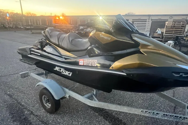 Slide: The Image of 2023 Kawasaki Jetski Ultra 310LX-S on trailer at sunset, parked outdoors. - 17