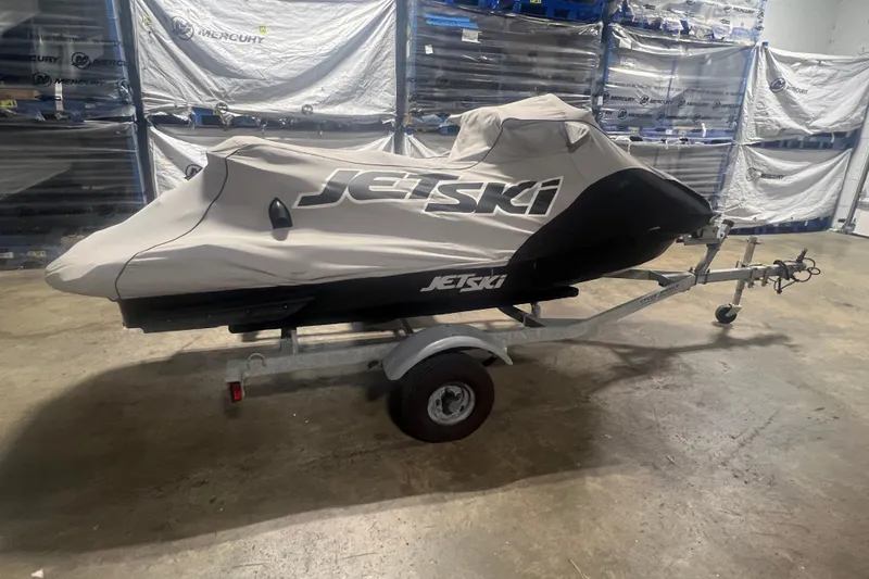 Slide: The Image of 2023 Kawasaki Jetski Ultra 310LX-S covered on trailer in storage facility. - 30